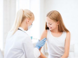 Teen girl getting vaccination: All About Women Women’s Health Awareness Blog