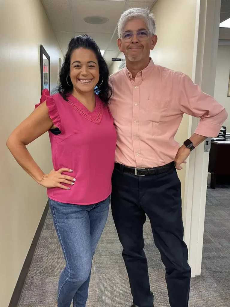 Jamie and Dr. Agrios showing support for Breast Cancer Awareness Month