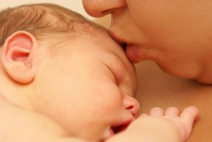mom kissing baby: All About Women Pregnancy and Prenatal Care blog